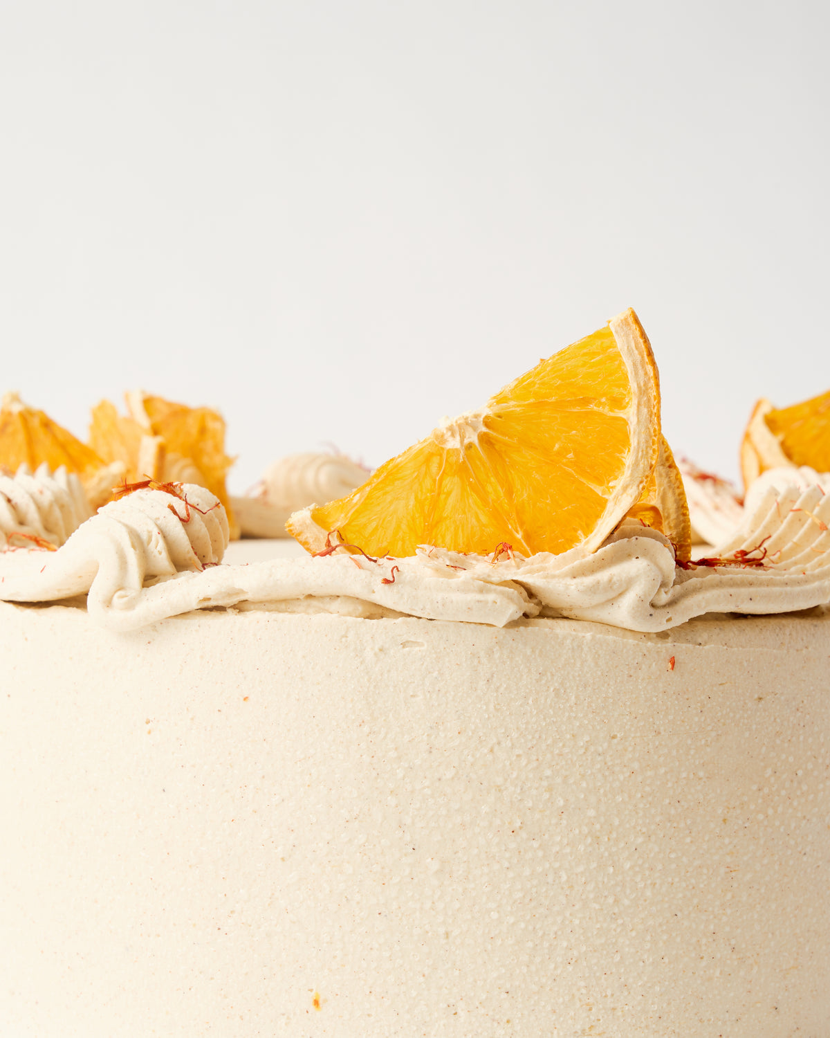 
                  
                    Orange Cardamom with Spiced Buttercream (Wheat free)
                  
                