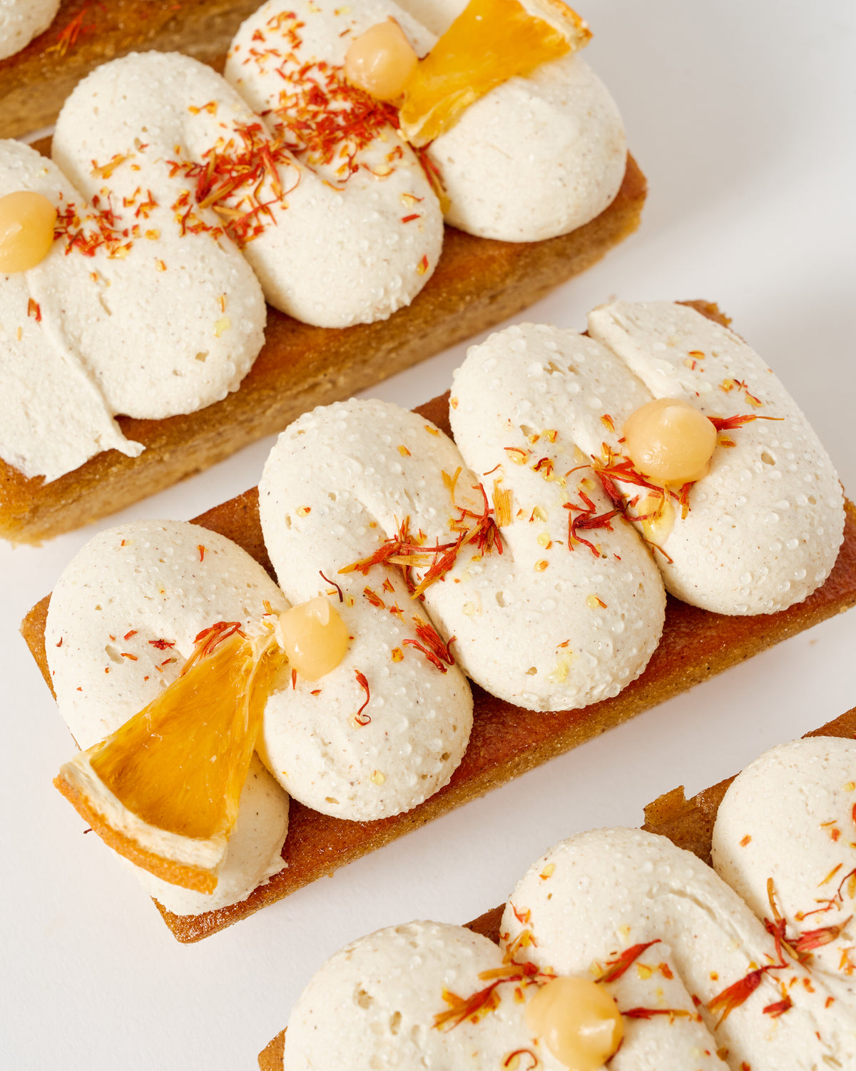 
                  
                    NEW - Orange Cardamom w Spiced Buttercream (Wheat free)
                  
                